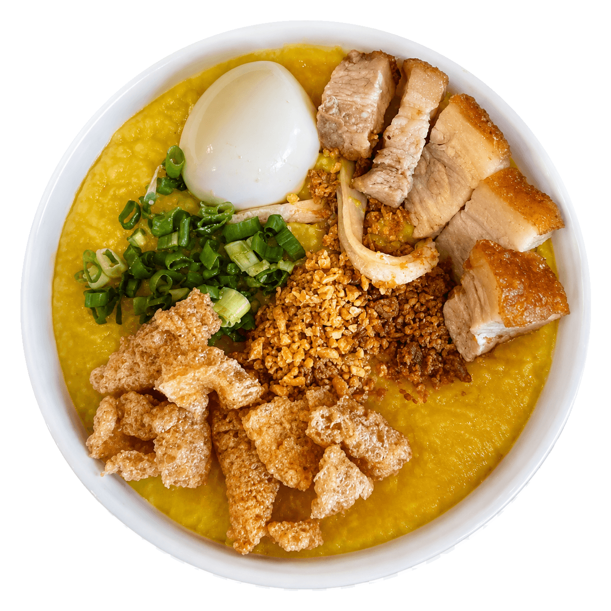 A bowl of Filipino fried rice garnished with herbs and lemon